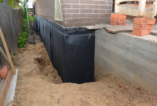 Happy homeowners after waterproofing job in Maynardville